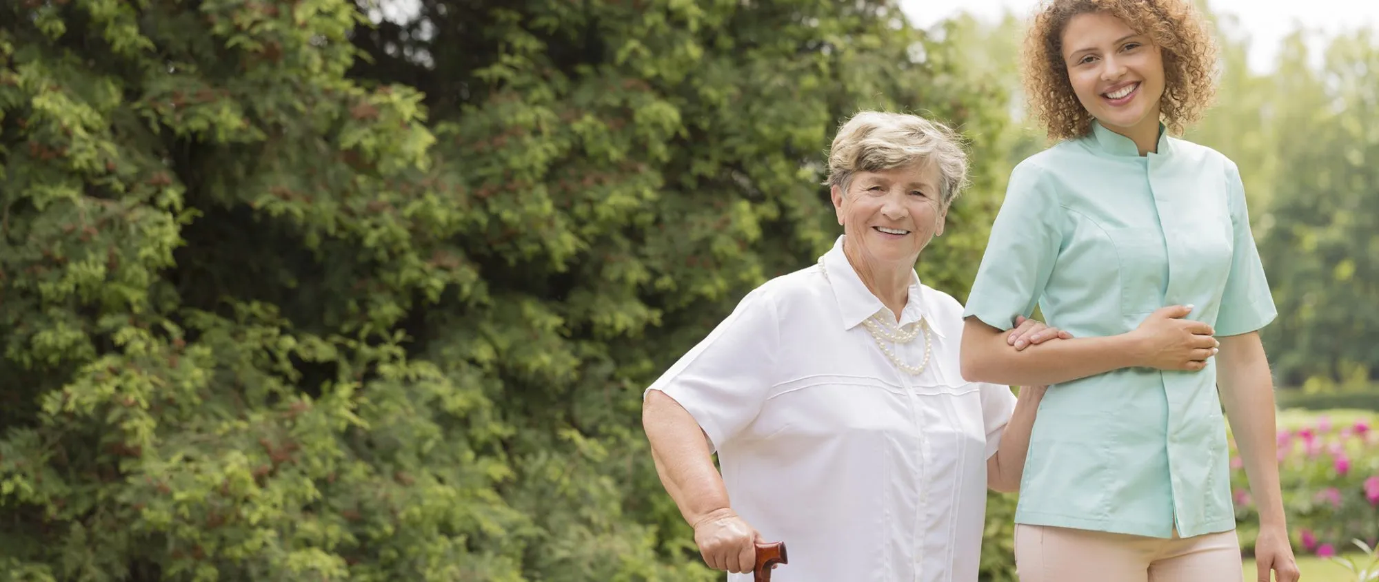 elderly woman and companion